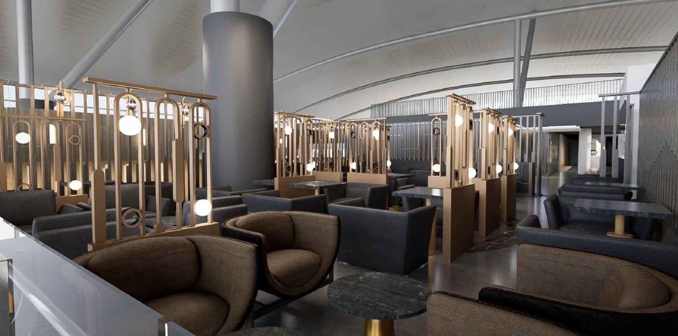 Luxurious seating area at Miracle First Class Lounge Satellite 1 Bangkok Suvarnabhumi Airport featuring plush armchairs, marble tables, and gold-accented lighting.