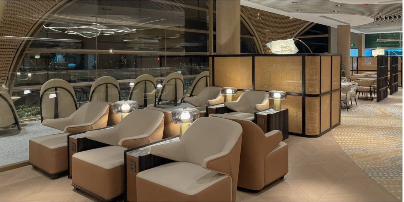 The seating area in the Plaza Premium Lounge at Techo International Airport features comfortable chairs with individual lamps and power outlets. The seating area in the Plaza Premium Lounge at Techo International Airport features comfortable chairs with individual lamps and power outlets.
