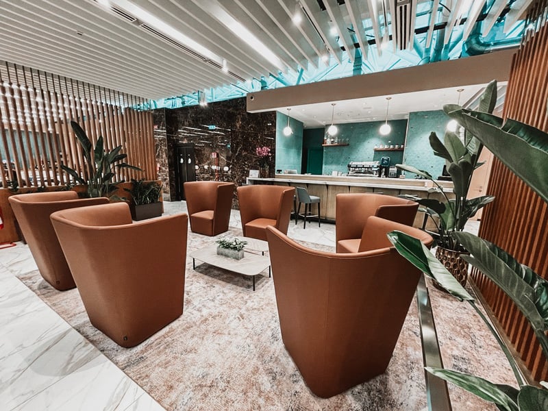 This image showcases the lounge area of the Plaza Premium Lounge at Fiumicino Airport's Terminal 1.