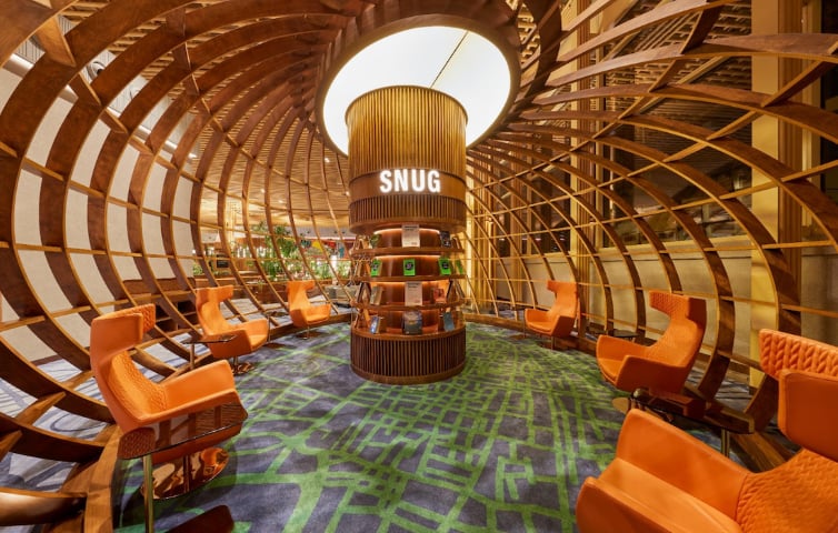 Snug Library Lounge area at the BLR 080 Domestic Lounge & VIP Domestic Lounge.