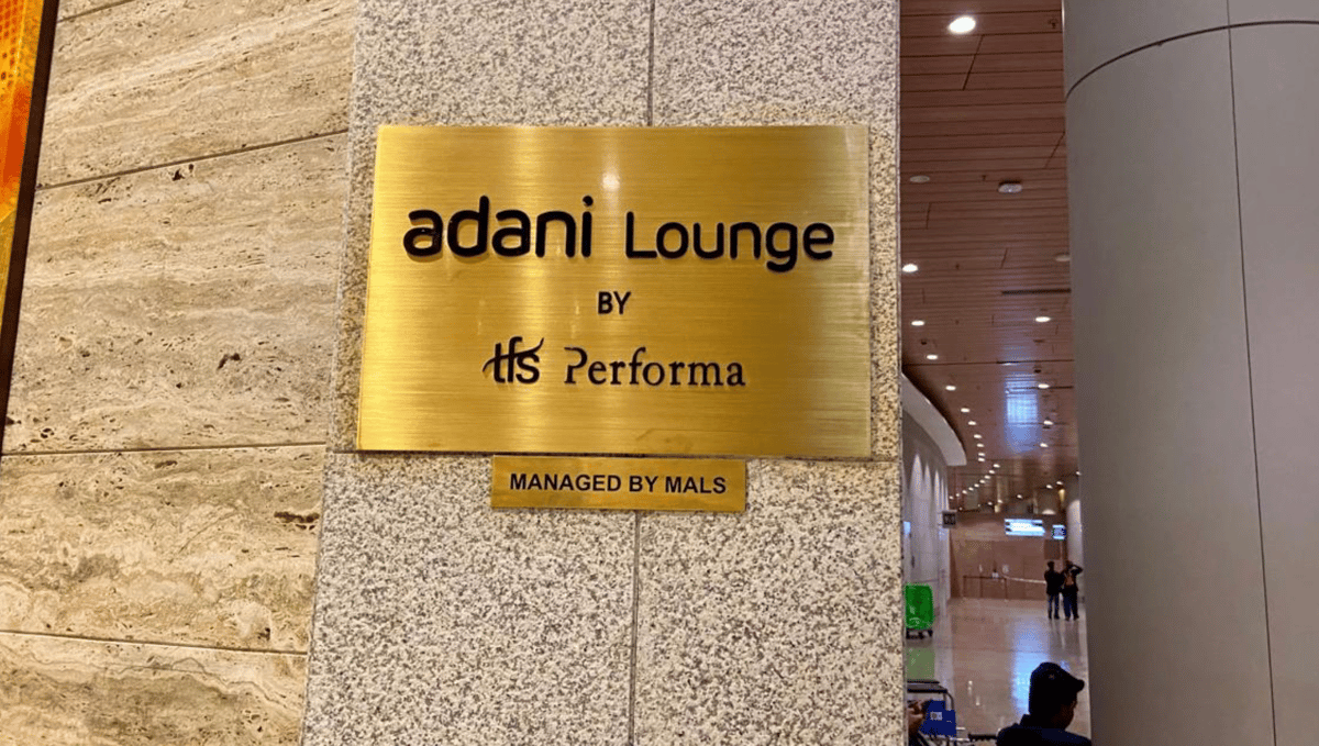Western Wing Adani Lounge at Mumbai Airport showing the lounge signage.