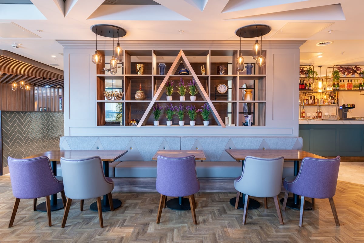 Seating area within the Edinburgh Aspire Lounge Gate 16