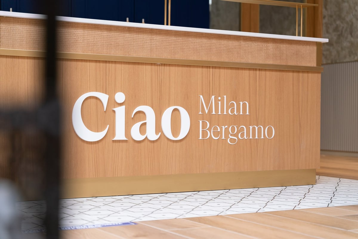 Ciao Milan Bergamo welcome plaque at airport lounges