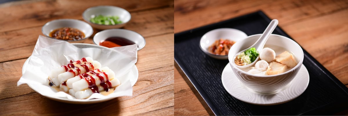 Food from the Hong Kong Plaza Premium Lounge (Gate 60). On the left is a plate of steamed rice rolls (Cheung fun) with sauces, and on the right is a bowl of noodle soup, fish balls, and tofu served on a black tray.