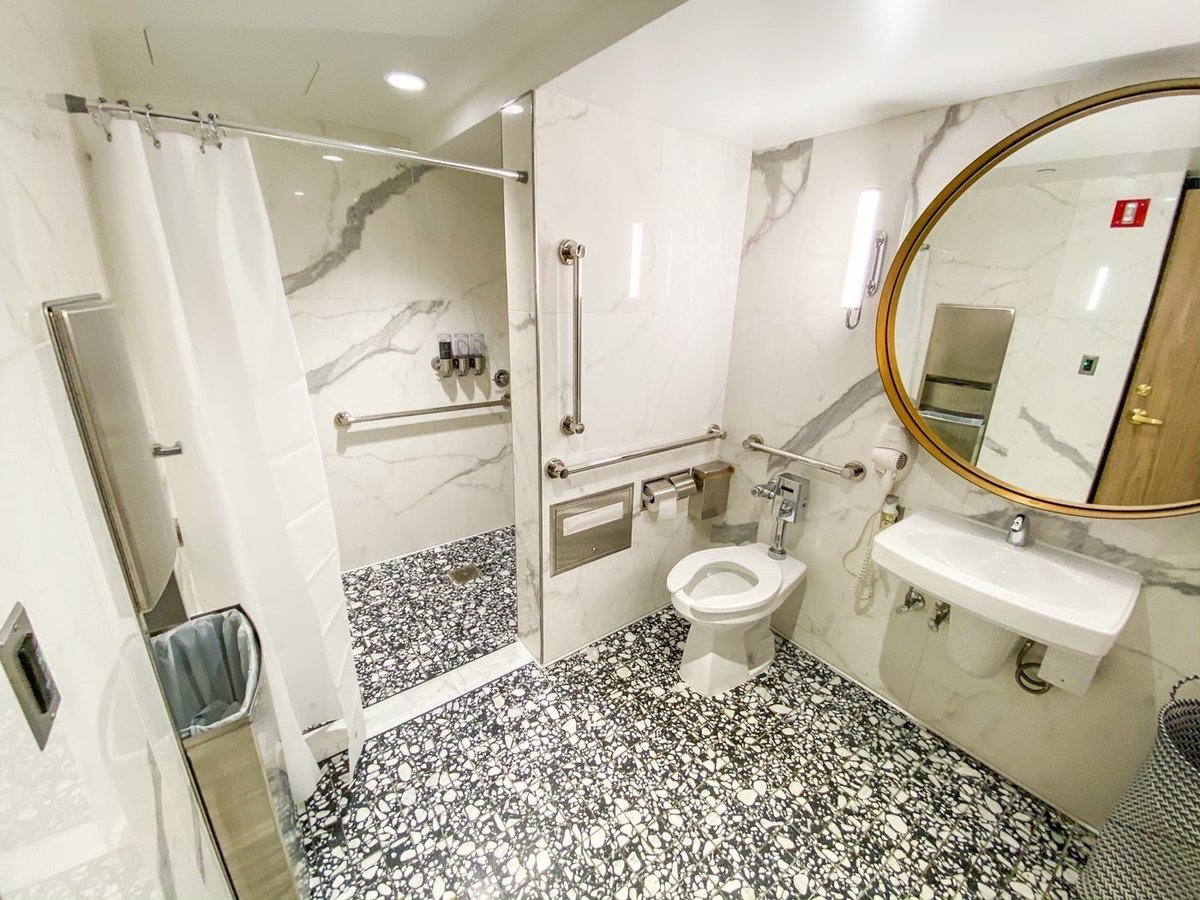 Shower bathroom at the T1 Primeclass Lounge at JFK Airport.
