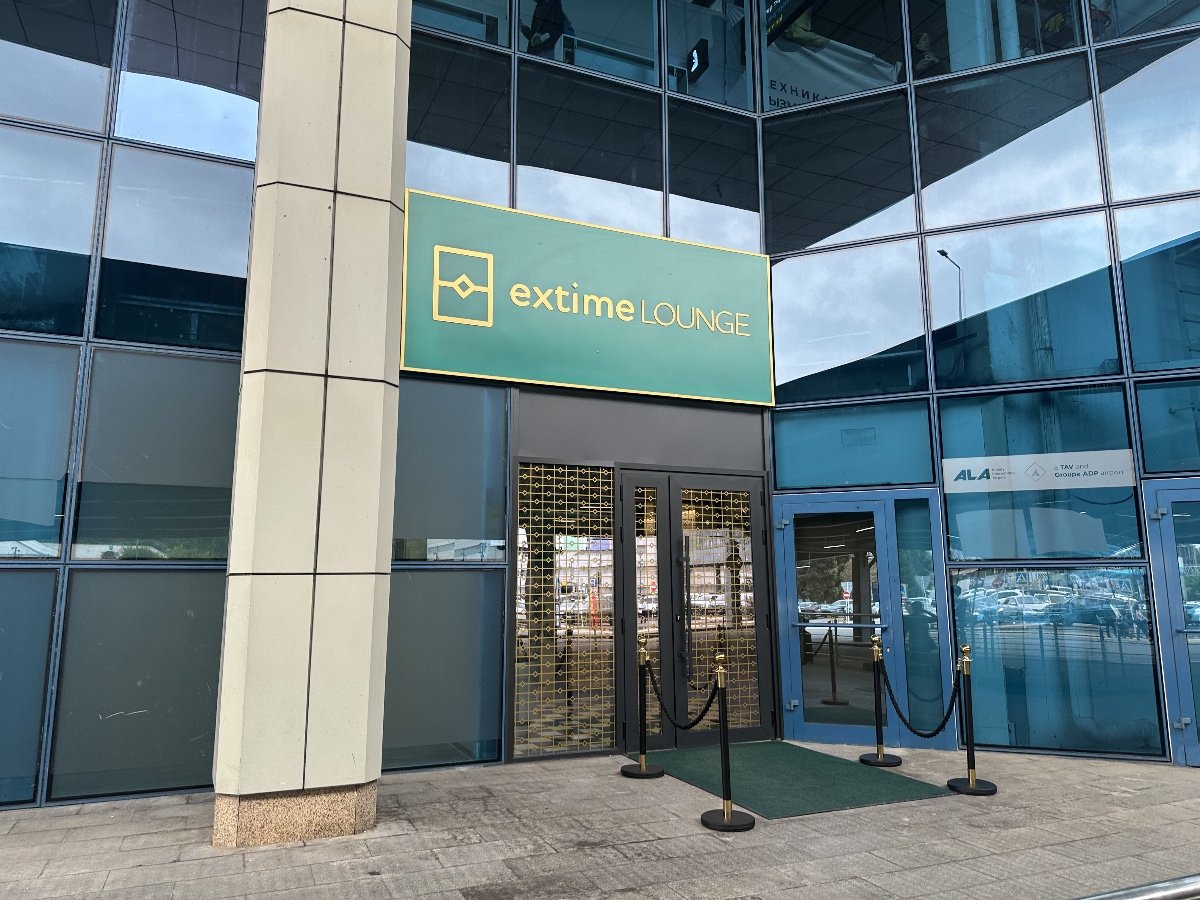 Extime domestic arrivals lounge door at Almaty Airport Terminal 1 Extime domestic arrivals lounge door at Almaty Airport Terminal 1