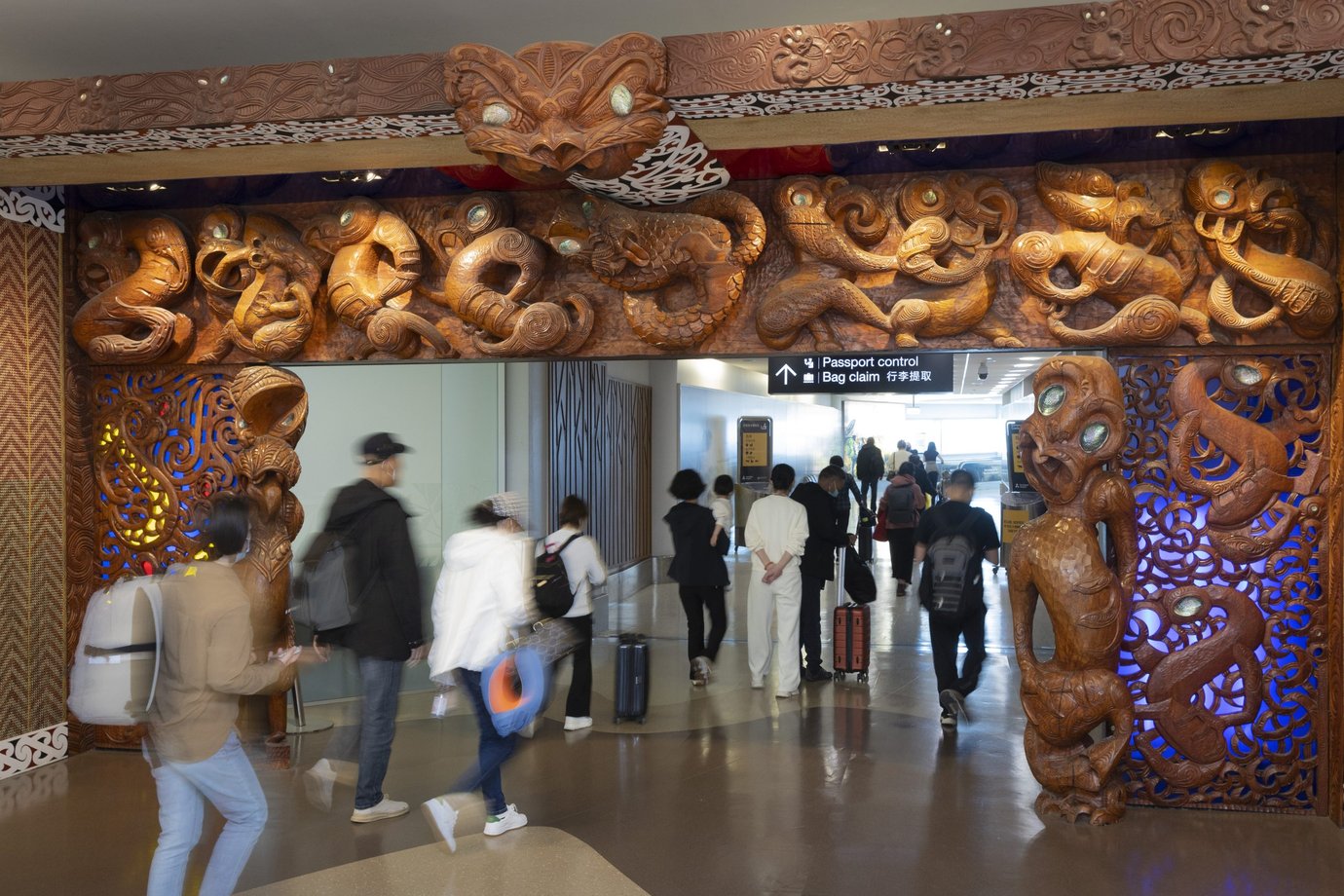 Passengers passing through Auckland Airport Passengers passing through Auckland Airport