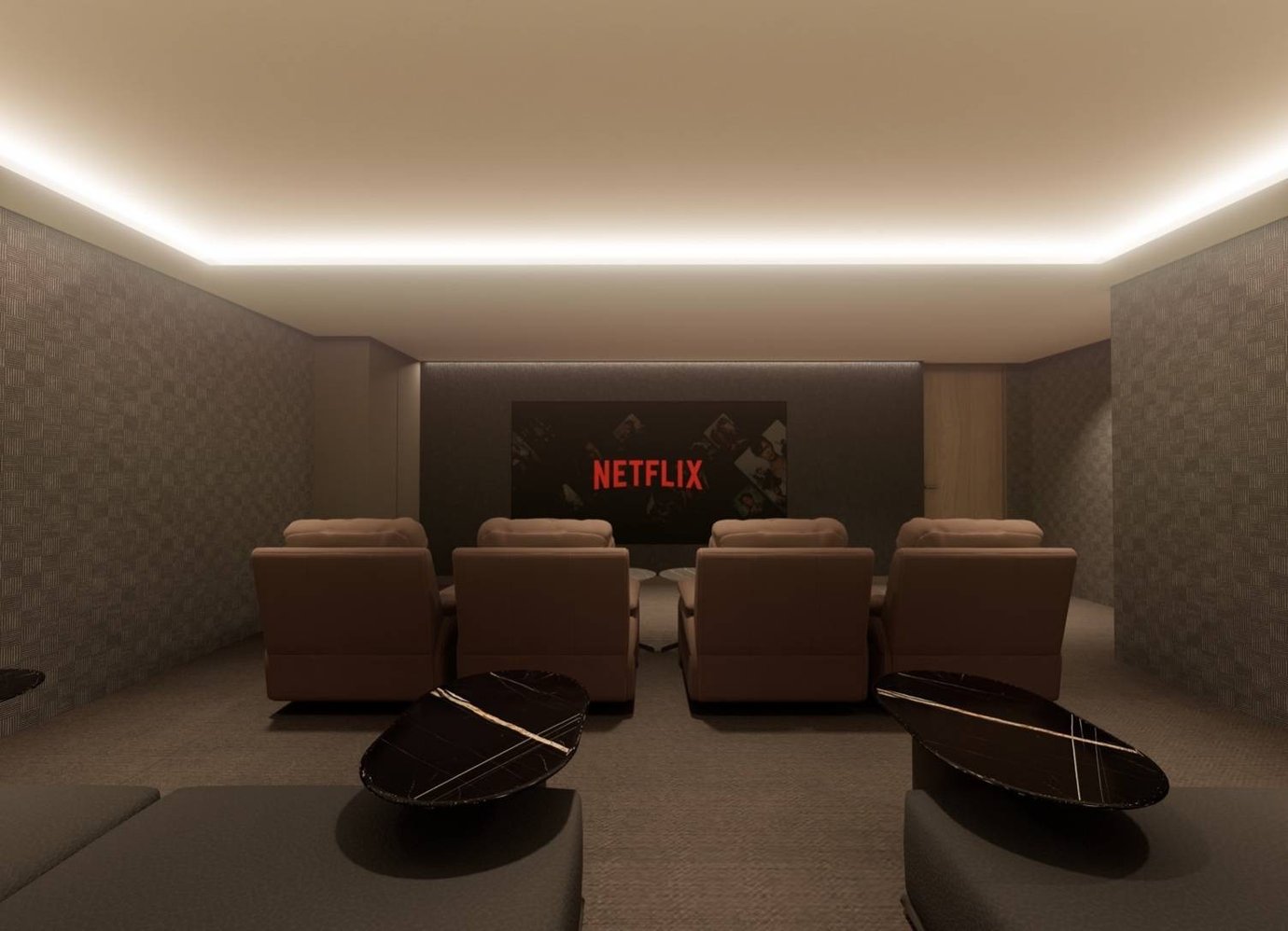 Private cinema room inside The Coral Finest Business Class Lounge, Concourse C, Bangkok Suvarnabhumi Airport, featuring plush recliner seating arranged in rows facing a large Netflix-equipped screen Private cinema room inside The Coral Finest Business Class Lounge, Concourse C, Bangkok Suvarnabhumi Airport, featuring plush recliner seating arranged in rows facing a large Netflix-equipped screen