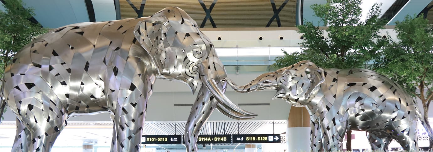 Large silver elephant statues at Bangkok’s Suvarnabhumi Airport representing Thai culture in the airport’s main terminal. Large silver elephant statues at Bangkok’s Suvarnabhumi Airport representing Thai culture in the airport’s main terminal.