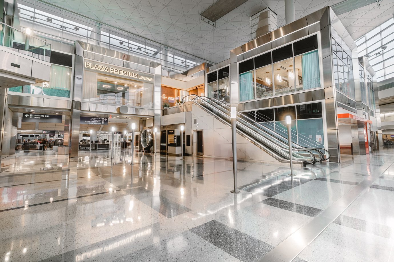 The entrance area to the Plaza Premium Lounge in Terminal D at DFW Airport. The entrance area to the Plaza Premium Lounge in Terminal D at DFW Airport.