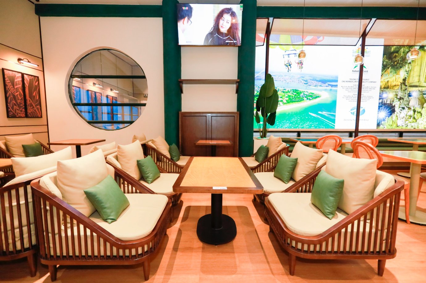 Comfortable lounge seating at SH Premium Lounge, Dong Hoi Airport (VDH), featuring cushioned sofas, wooden furniture, and TV entertainment. Comfortable lounge seating at SH Premium Lounge, Dong Hoi Airport (VDH), featuring cushioned sofas, wooden furniture, and TV entertainment.