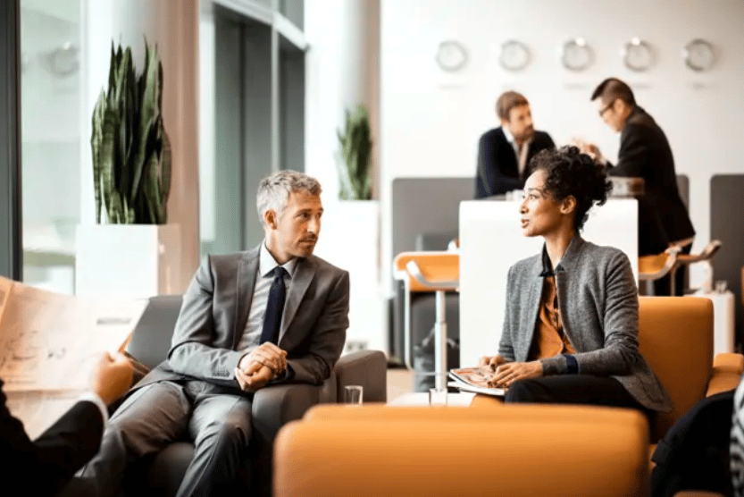 Lufthansa Airport Lounge Stock Image - Two people in lounge waiting for flight Lufthansa Airport Lounge Stock Image - Two people in lounge waiting for flight