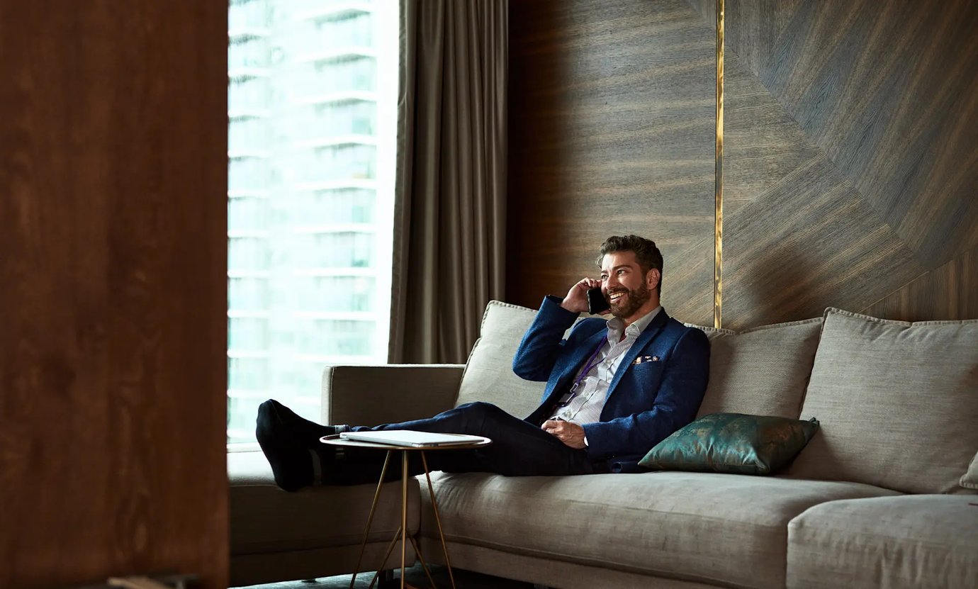 Man relaxing in an airport lounge